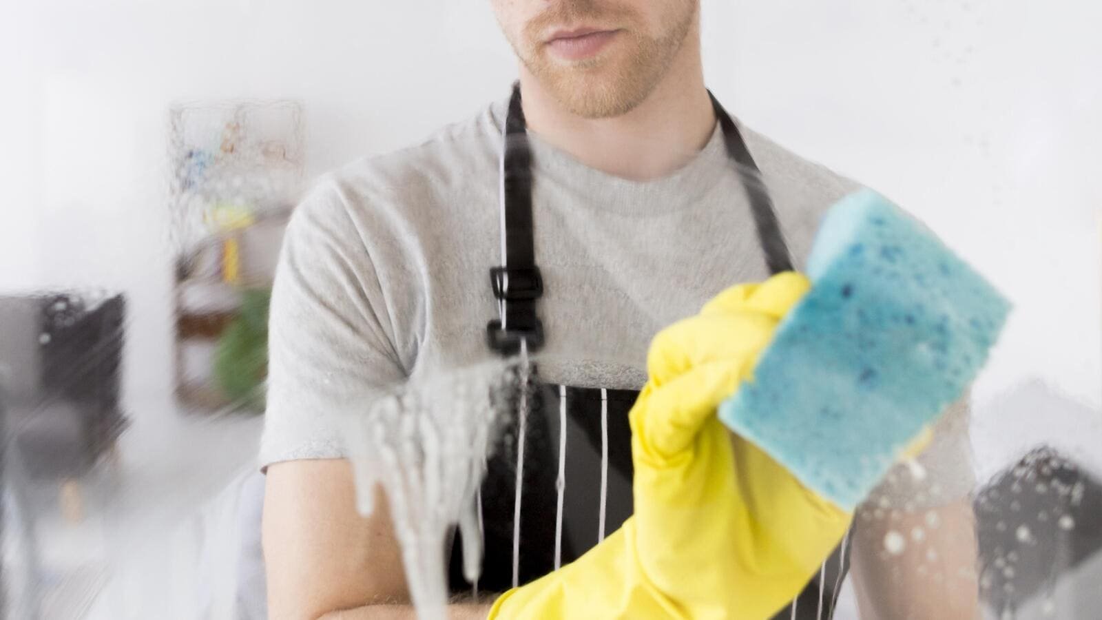 close-up-male-cleaning-window portrait-man-cleaning-staircase-handrail-gloves housewife-woking-home-lady-blue-shirt-woman-bathroom low-angle-view-senior-woman-wiping-glass-table-with-spray Residential Cleaning Services Orange Park