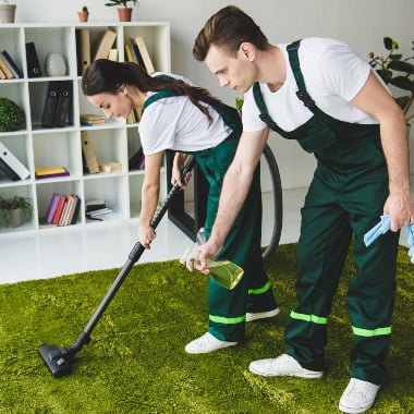 young-cleaning-company-workers-cleaning-carpet-wit-2021-08-29-22-49-49-utc.jpg